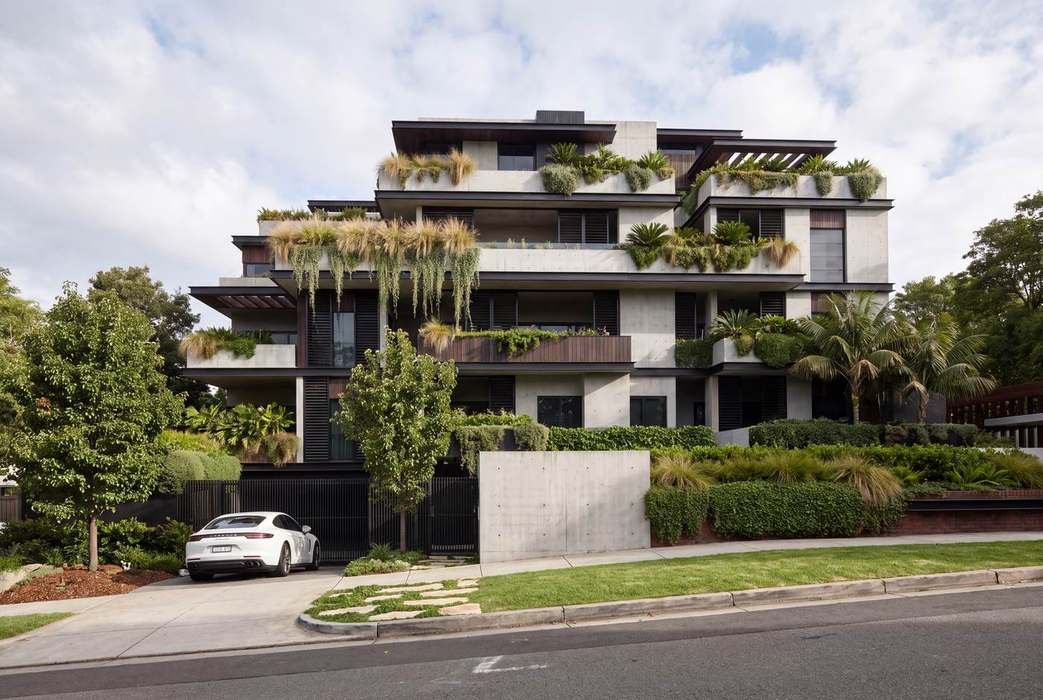 Apartment building with green balconies